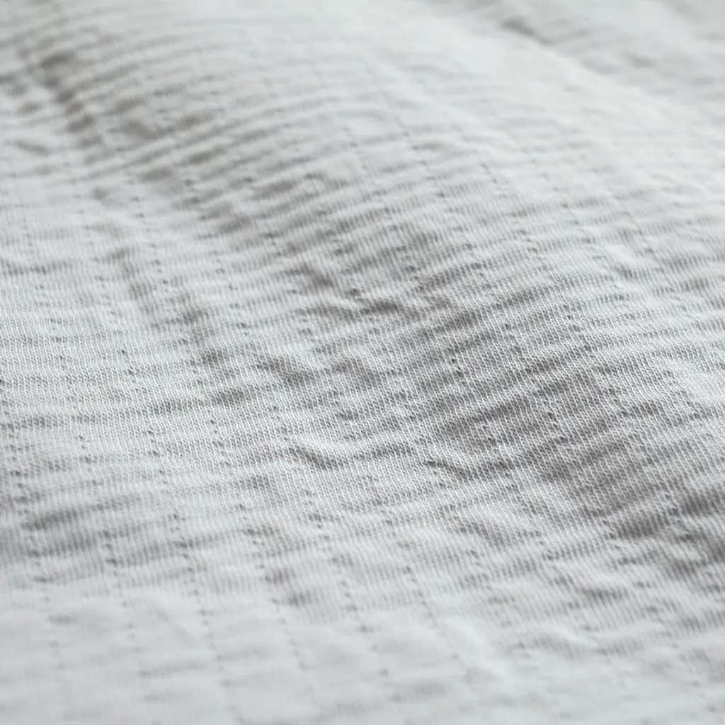 Bed_&_playpen_bumper_Pady_tetra_jersey_30x180cm_CADUM_Grizou (1).webp