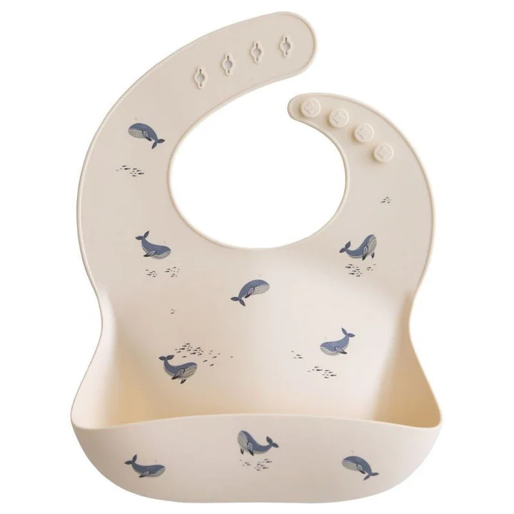Bavoir en silicone - Mushie - Baleine 