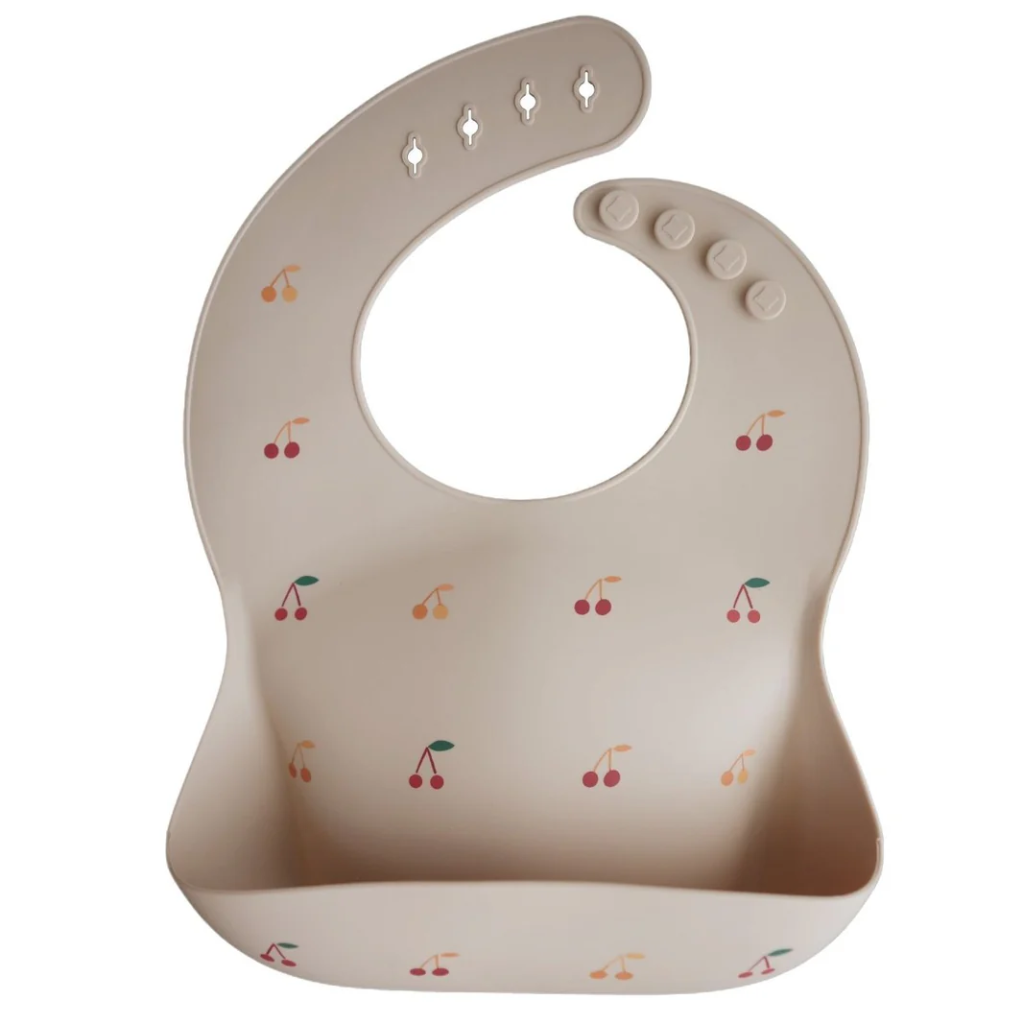Bavoir en silicone - Mushie - Cerise 