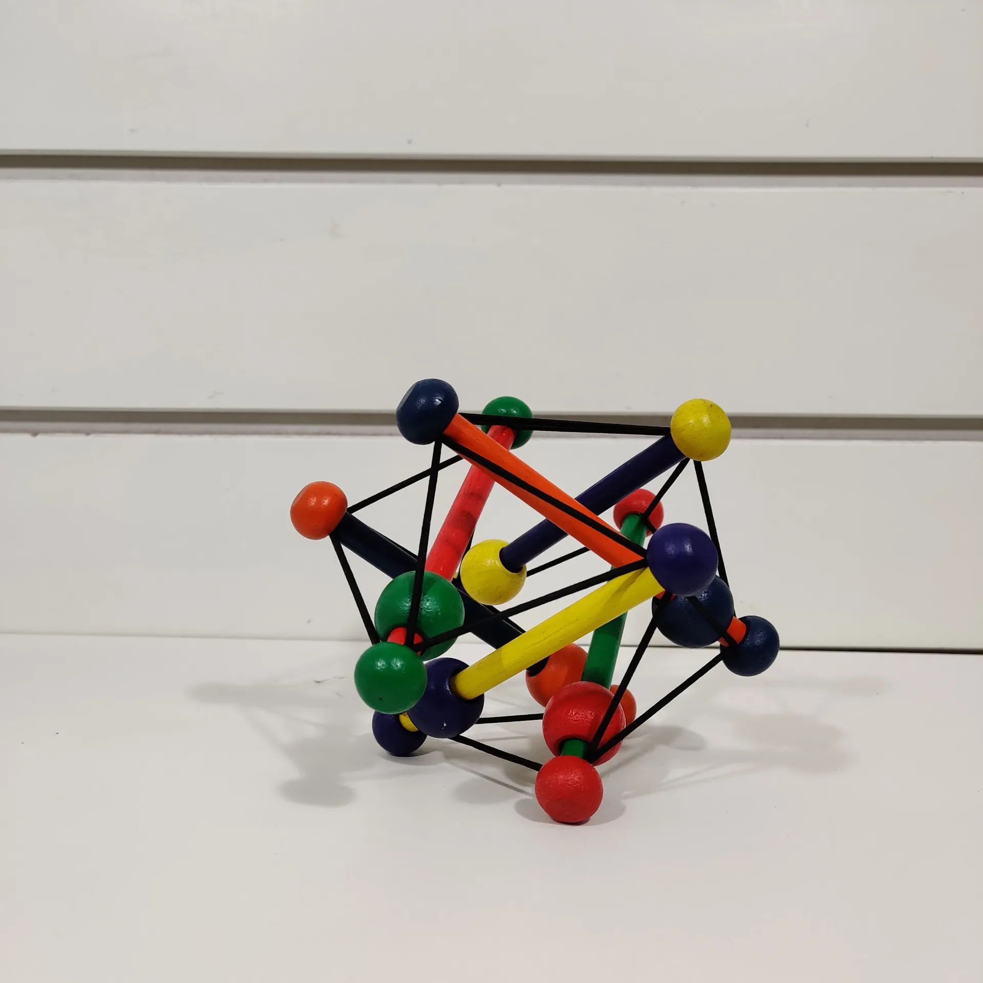 Hochet en bois Skwish - Manhattan Toys